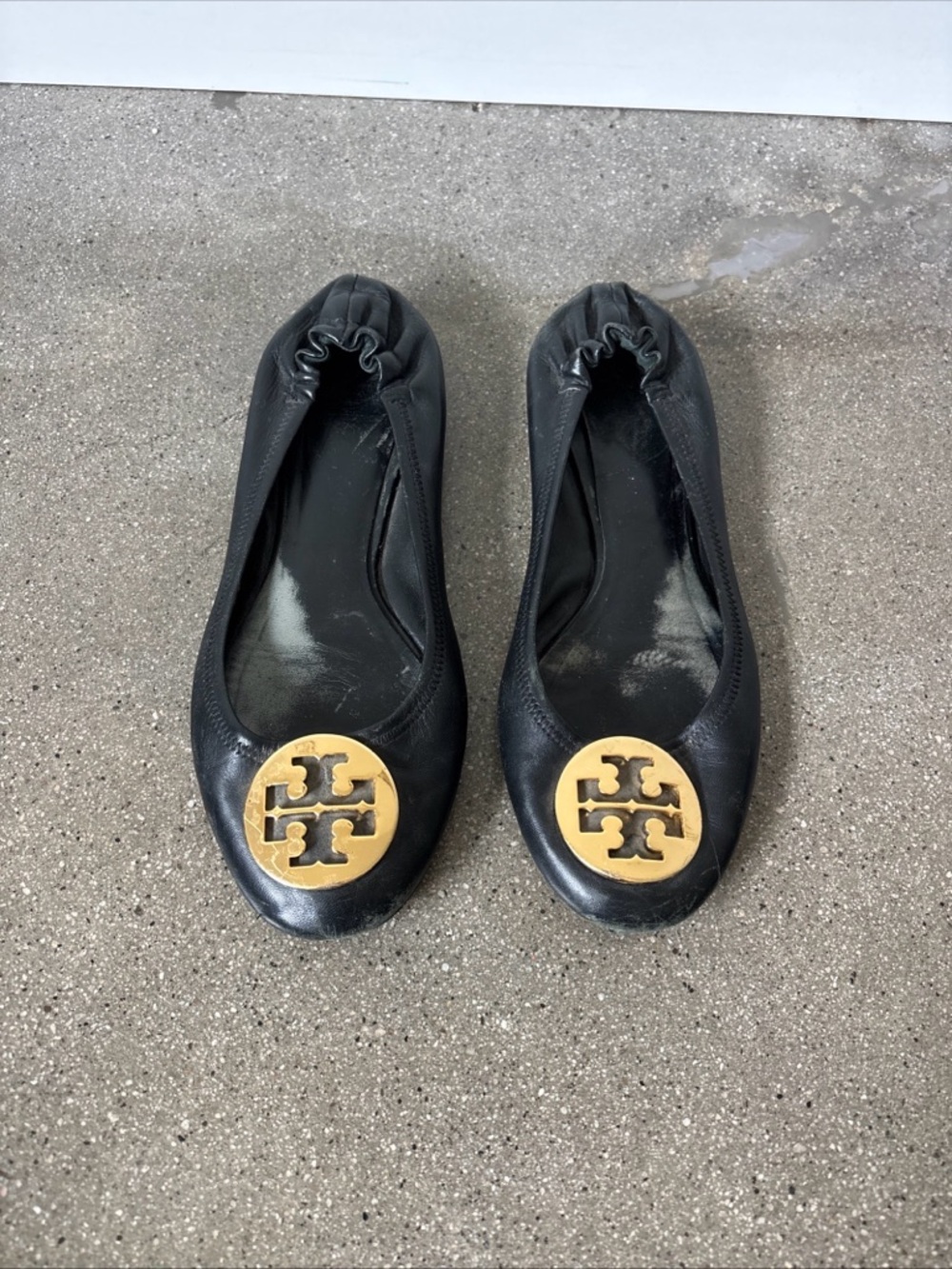 Tory Burch Black Leather Logo Ballet Flats with Gold Emblem